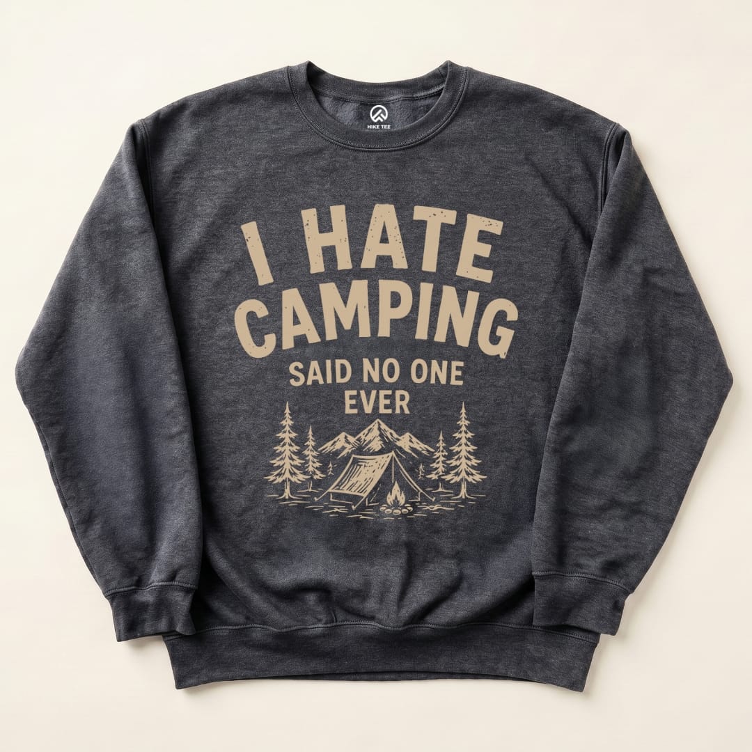 A dark sweatshirt features the humorous phrase "I Hate Camping Said No One Ever" with a camping scene graphic below.