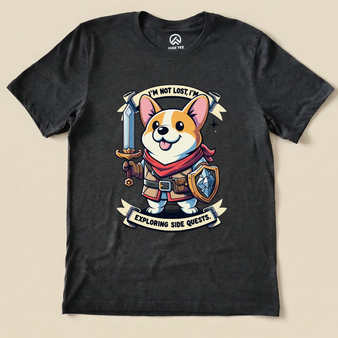 A graphic t-shirt features a cheerful corgi in a fantasy outfit holding a sword and shield, with the words "I'm Not Lost, I'm Exploring Side Quests.
