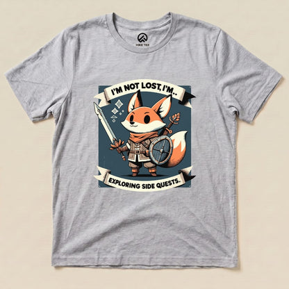 The graphic t-shirt features a cartoon fox holding a spear and shield, with the text "I'm Not Lost, I'm Exploring Side Quests" prominently displayed.