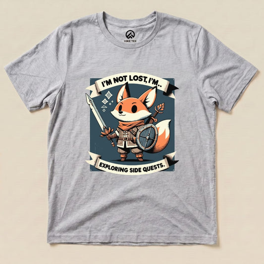 The graphic t-shirt features a cartoon fox holding a spear and shield, with the text "I'm Not Lost, I'm Exploring Side Quests" prominently displayed.