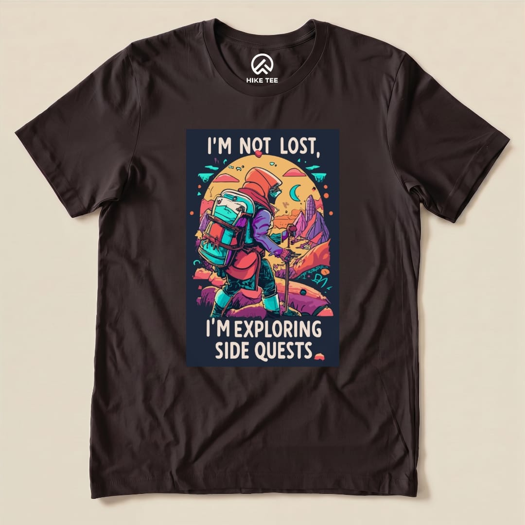 The "I'm Not Lost Shirt" features a colorful graphic of a hiker with a backpack, stating "I'm Not Lost, I'm Exploring Side Quests.