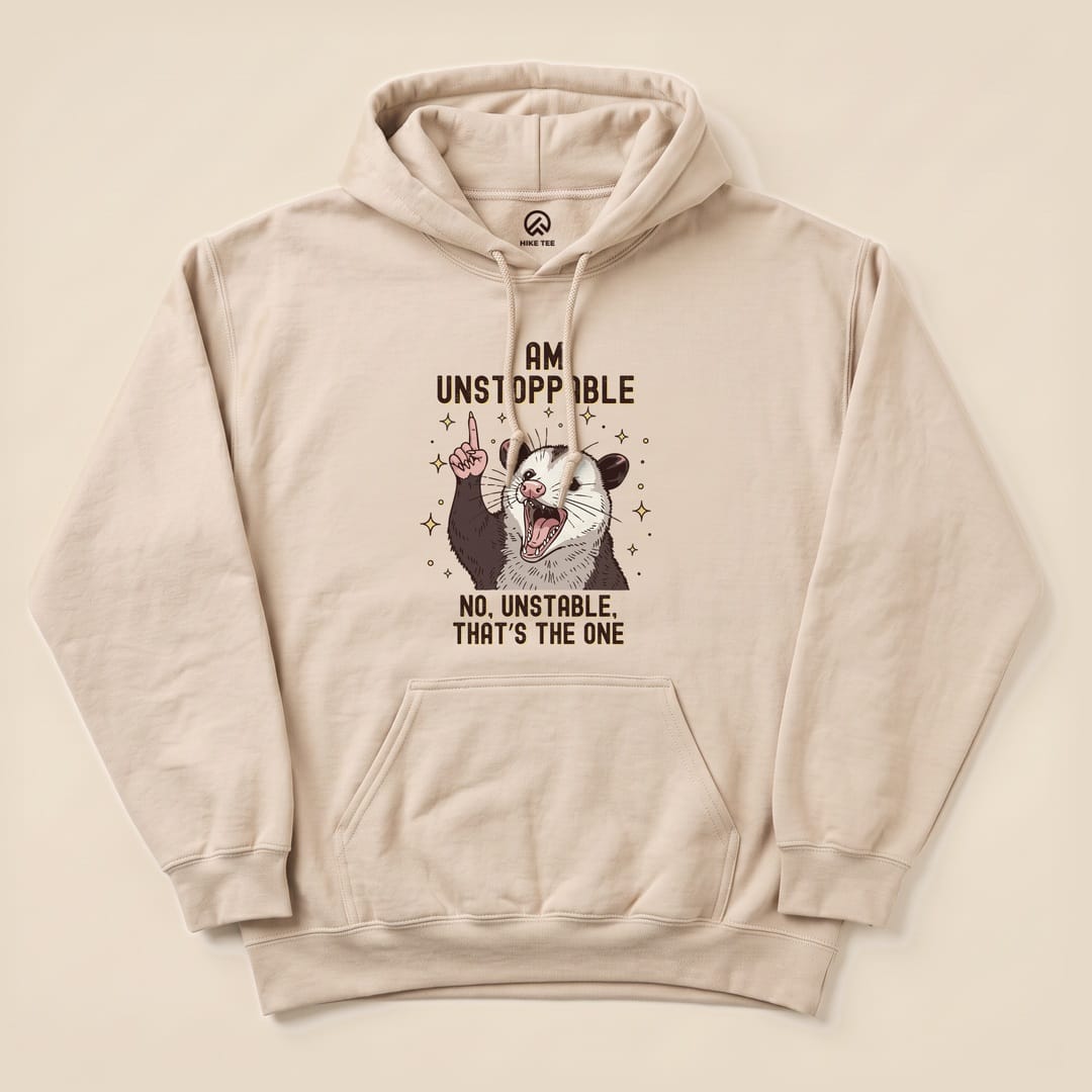 Sand I'm Unstoppable Possum Hoodie with a screaming possum "I Am Unstoppable - No, Unstable" graphic