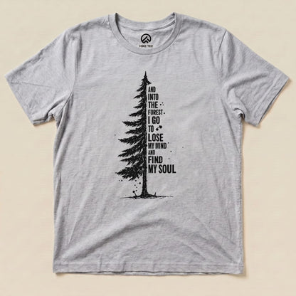A light gray graphic t-shirt from Hike Tee features a tall tree illustration and the phrase "And into the forest I go to lose my mind and find my soul," titled "In The Forest Shirt.