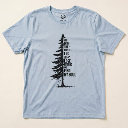 A light blue graphic t-shirt features a tall tree design with the phrase "and into the forest I go to lose my mind and find my soul.