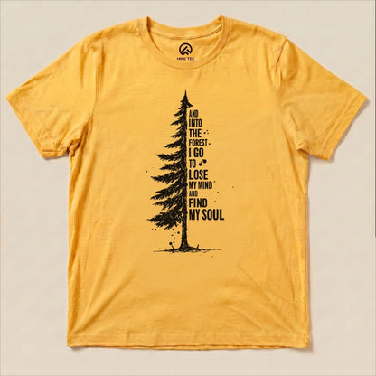 A flat, yellow graphic t-shirt features a tall tree illustration with the text "And into the forest I go to lose my mind and find my soul," labeled as "In The Forest Shirt.