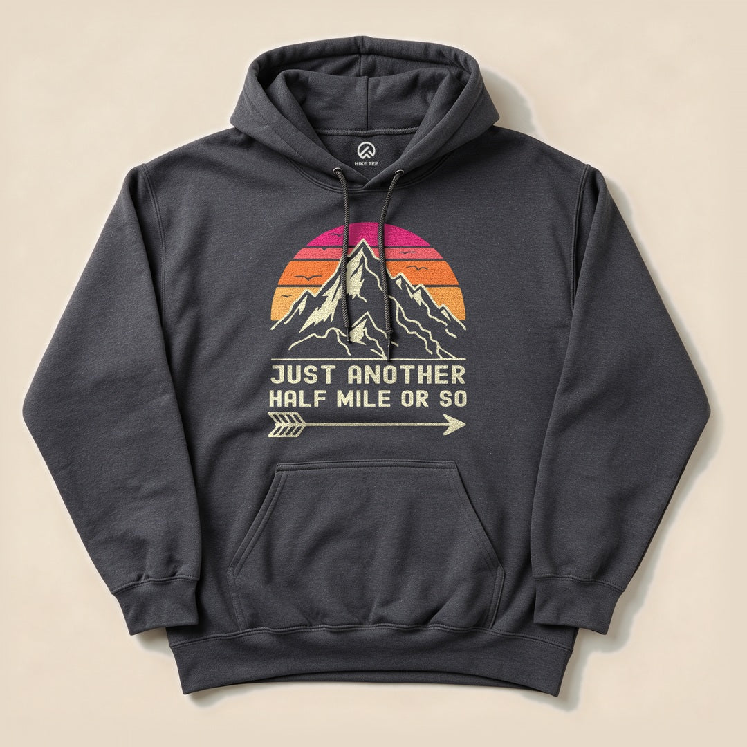 Dark Heather Just Another Half Mile Hoodie with a retro mountain sunset graphic