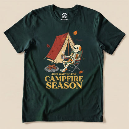Forest Just Waiting for Campfire Season Shirt with a skeleton in a camp chair by a tent graphic