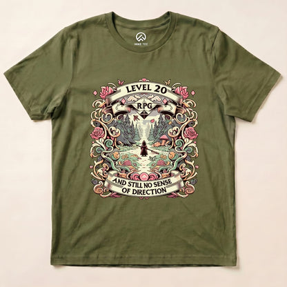 The graphic t-shirt features the text "Level 20 RPG" and "AND STILL NO SENSE OF DIRECTION" surrounded by vibrant floral designs.
