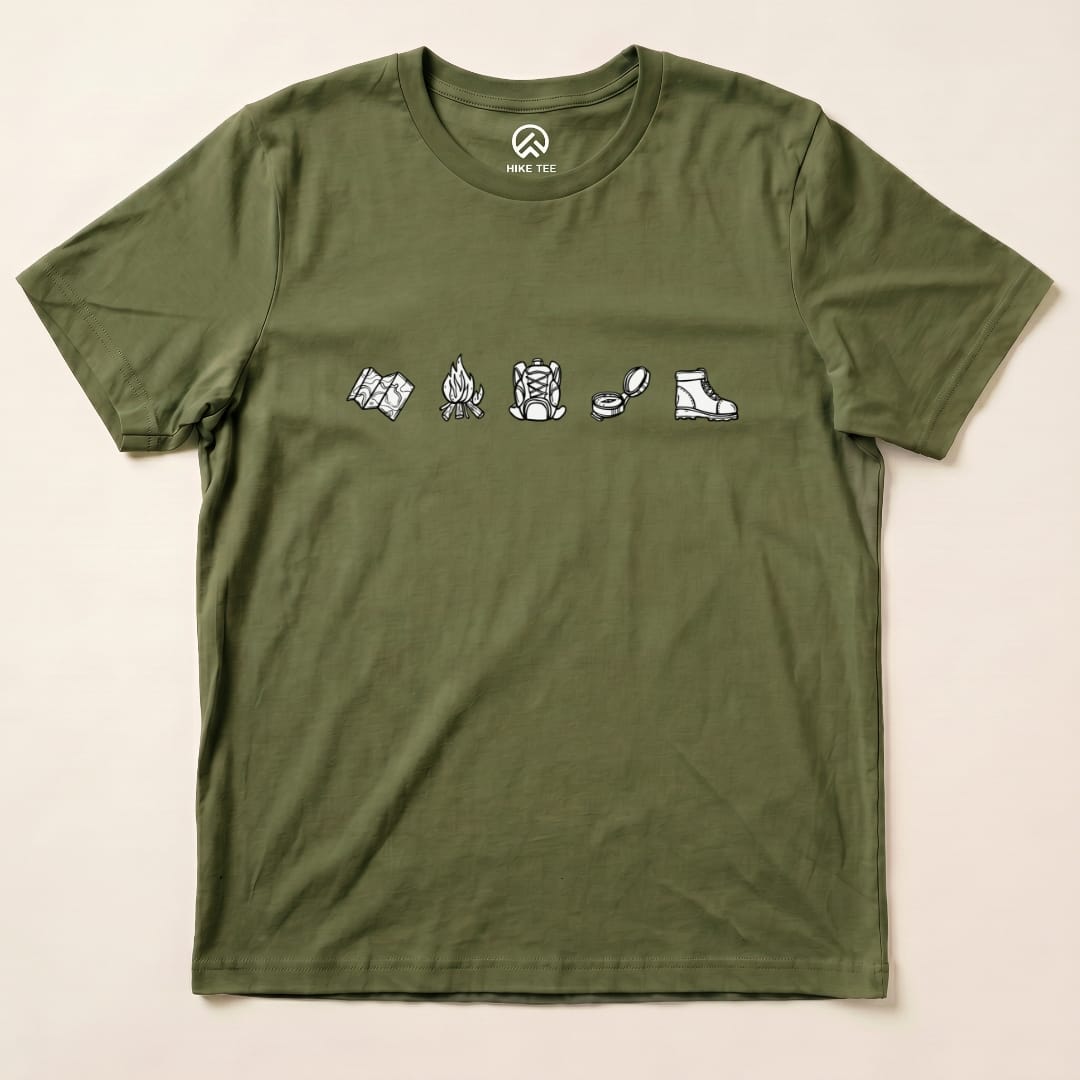 A minimalistic drawing hiking shirt featuring a series of outdoor-themed icons, including a map, campfire, backpack, and hiking boot.