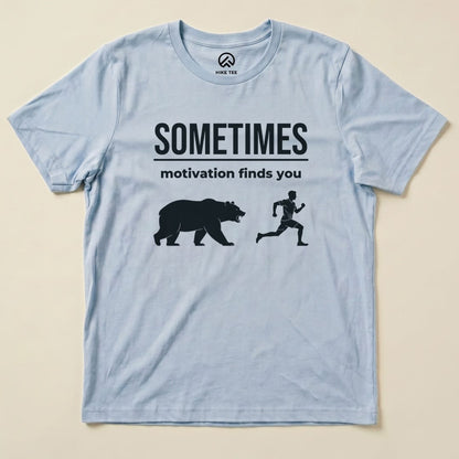 Baby Blue Motivation Finds You Shirt with a bear chasing a runner graphic