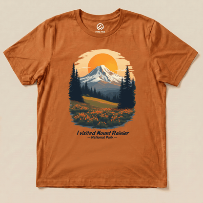 A graphic t-shirt features a scenic illustration of Mount Rainier with the slogan "I visited Mount Rainier National Park" below.