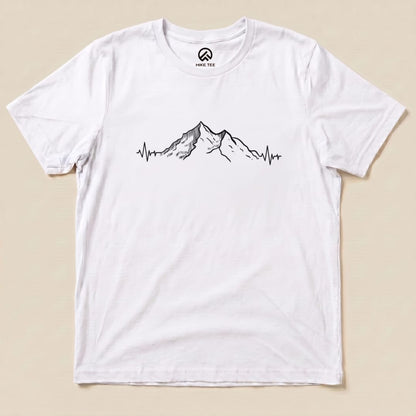 A white graphic t-shirt featuring a mountain range design integrated with a heartbeat line, labeled as the "Mountains Heart Rate Shirt.