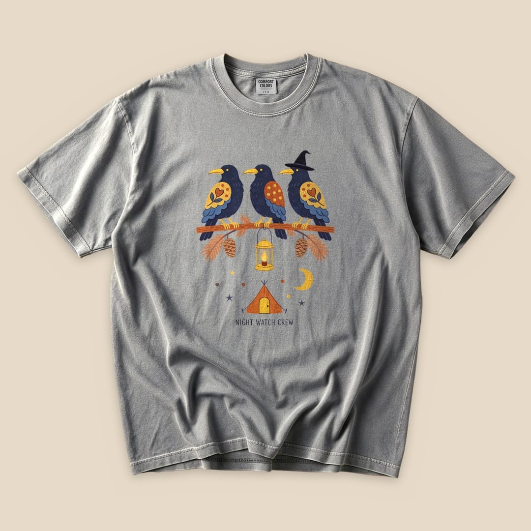 The gray graphic t-shirt features three colorful birds on a branch, with the text "NIGHT WATCH CREW" and camping icons below.