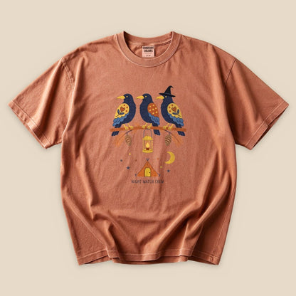 The "Night Watch Crew T-Shirt" features a colorful graphic of three birds on a branch with a tent and moon design.