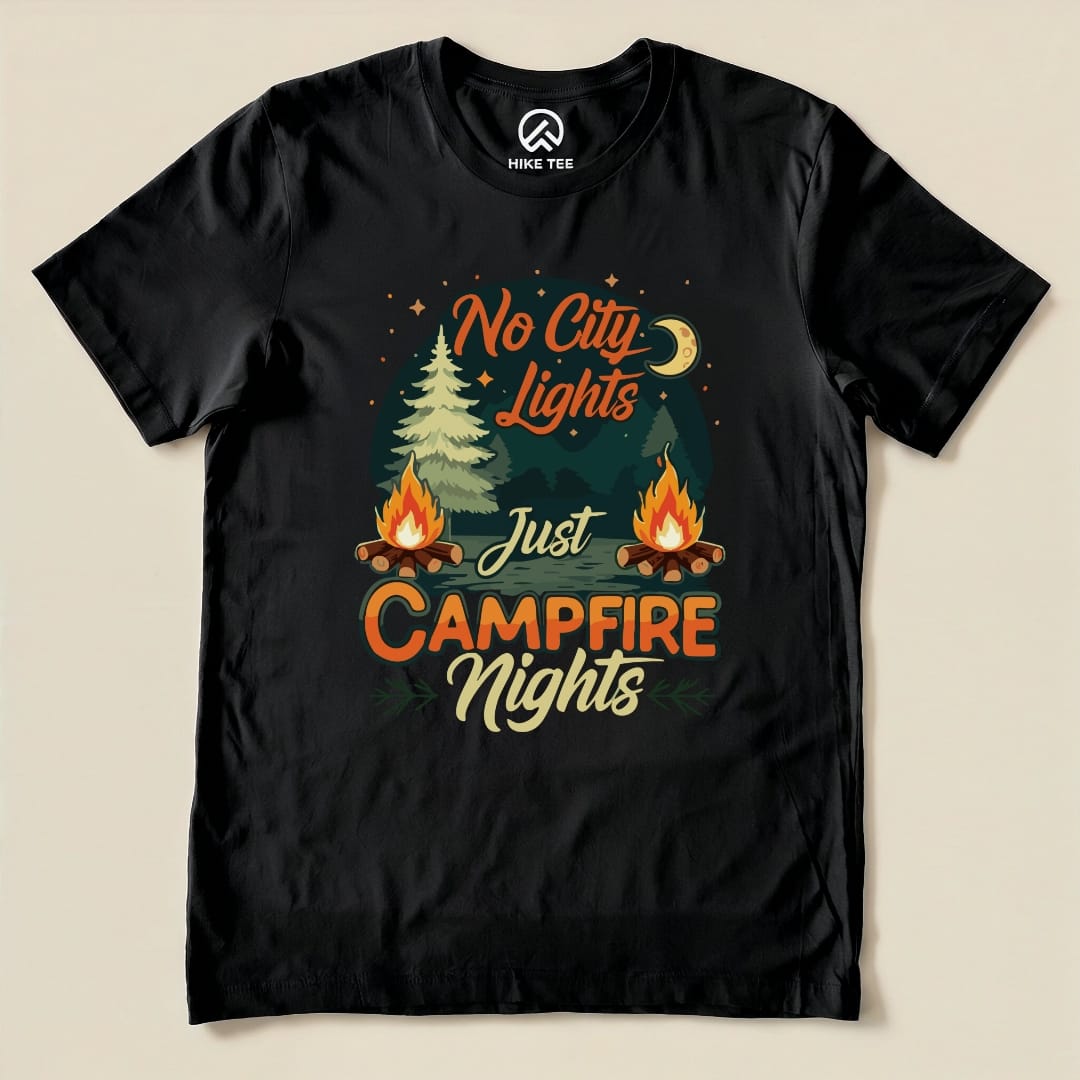 The black graphic t-shirt features the slogan "No City Lights Just Campfire Nights" with illustrations of trees and campfires.
