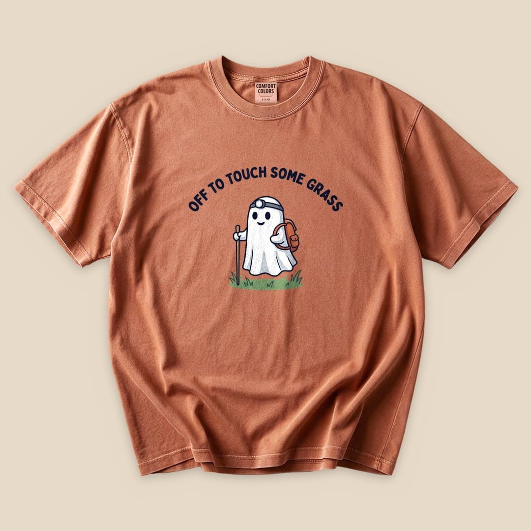 Yam Off to Touch Some Grass T-Shirt with a ghost hiker with a headlamp and backpack graphic