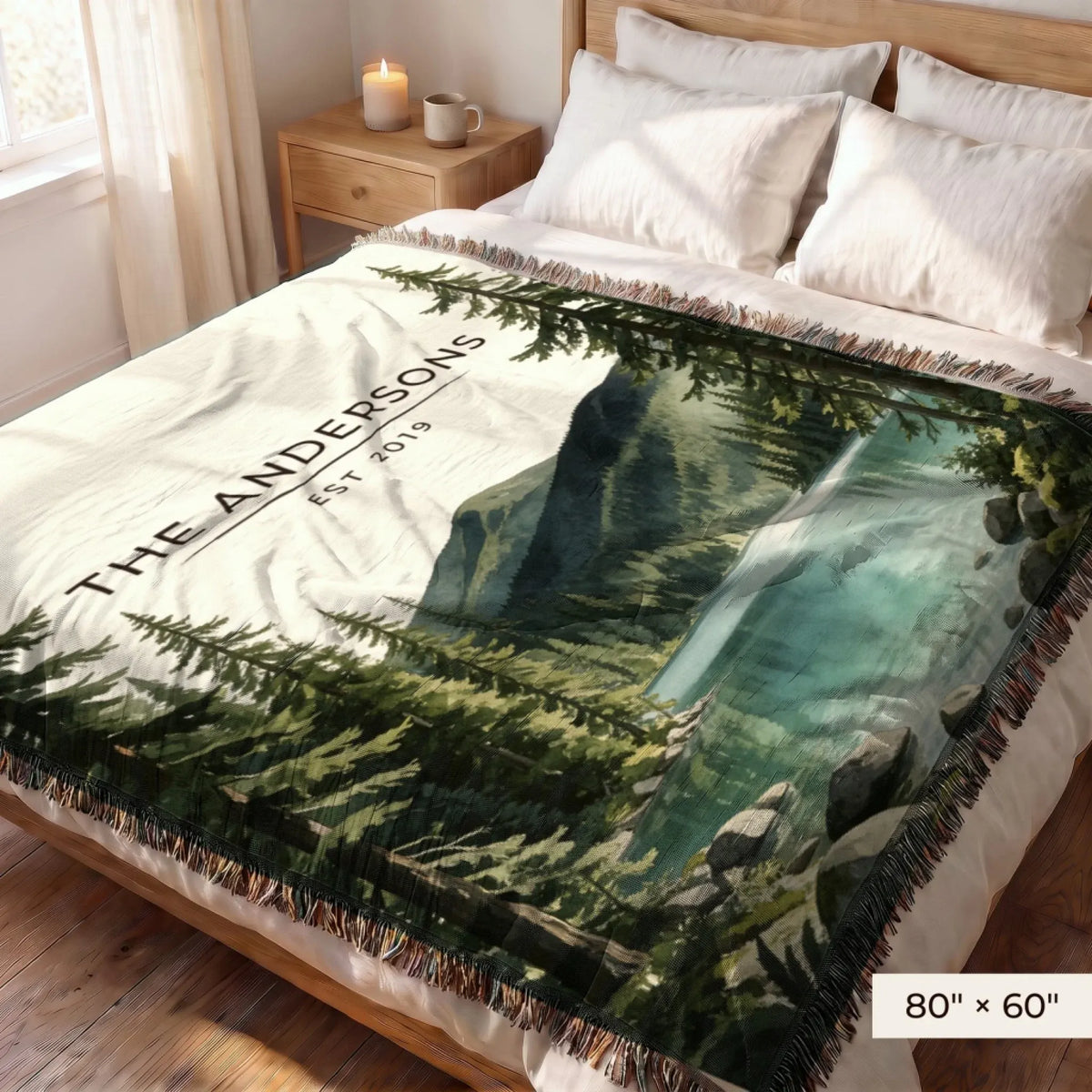 Olympic Lake Crescent Woven Blanket 80x60 on a queen bed