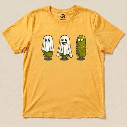 A graphic t-shirt featuring three cartoon pickle ghosts, with playful expressions, against a vibrant yellow background.