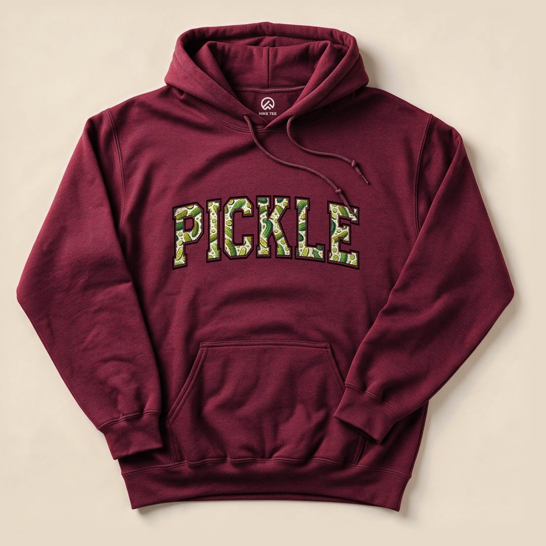A maroon Pickle Hoodie featuring bold, colorful lettering spelling "PICKLE" with a pickle pattern design.