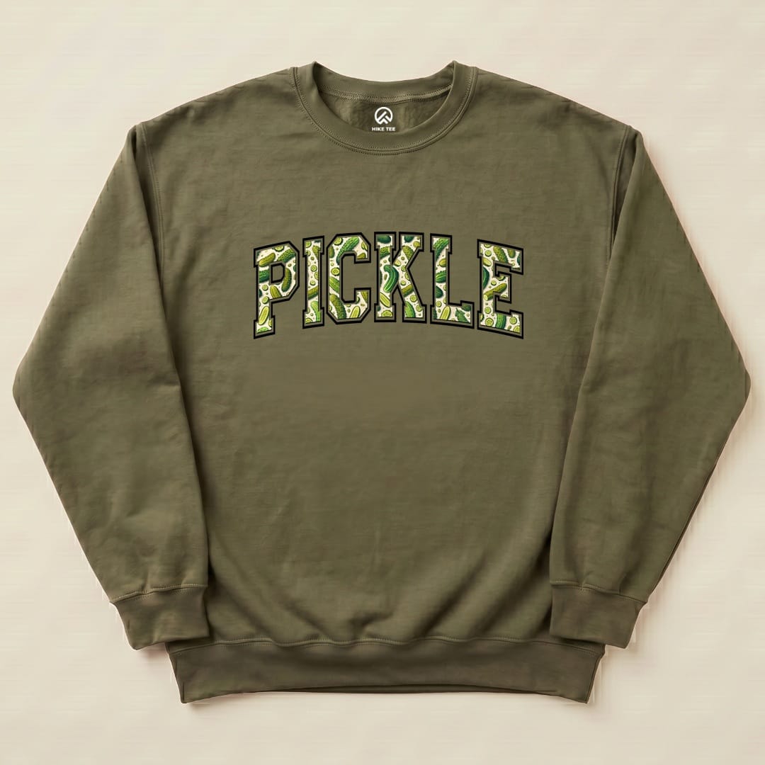 An olive green "Pickle Sweatshirt" featuring bold, playful lettering spelling "PICKLE" with a whimsical pickle design.