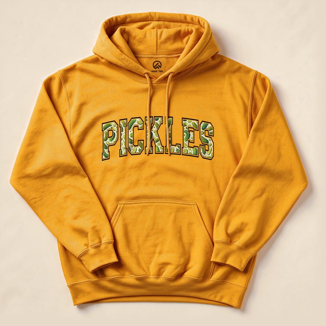 A vibrant yellow "Pickles Hoodie" featuring bold, green lettering outlined and filled with pickle graphics.