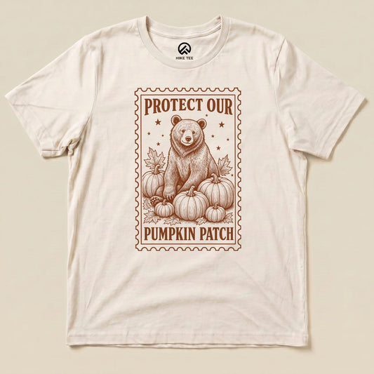 Natural Protect Our Pumpkin Patch Shirt with a bear among pumpkins in a vintage stamp frame graphic