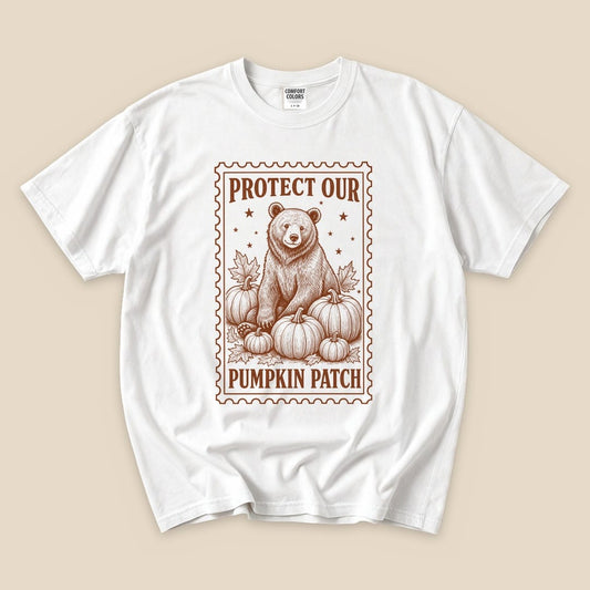 White Protect Our Pumpkin Patch T-Shirt with a vintage bear guarding a pumpkin patch graphic