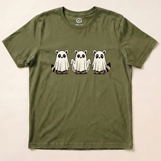 The Raccoon Ghosts Shirt features three cute raccoons in ghost costumes on an olive green graphic t-shirt.