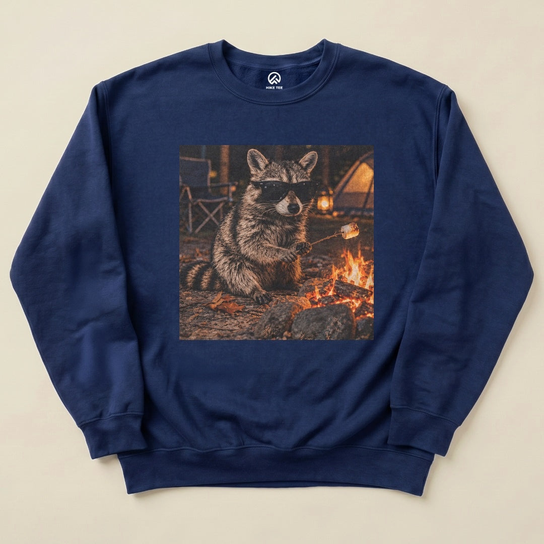 Navy Raccoon in Sunglasses Sweatshirt with a raccoon in sunglasses roasting a marshmallow by the campfire graphic
