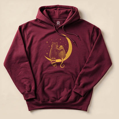 Maroon Raccoon Possum Moon Hoodie with a raccoon and possum sitting on a crescent moon graphic