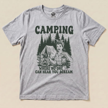 Graphic t-shirt featuring the slogan "Camping Where No One Can Hear You Scream" with a retro camper girl and a tent design.