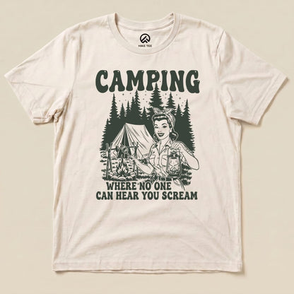 The Retro Camping Scream Shirt features a graphic of a smiling woman holding a lantern in a forest setting with a tent, saying "WHERE NO ONE CAN HEAR YOU SCREAM.