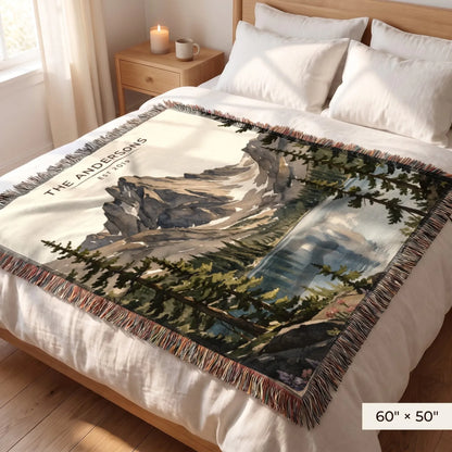 Rocky Mountain Dream Lake Woven Blanket 60x50 on a queen bed