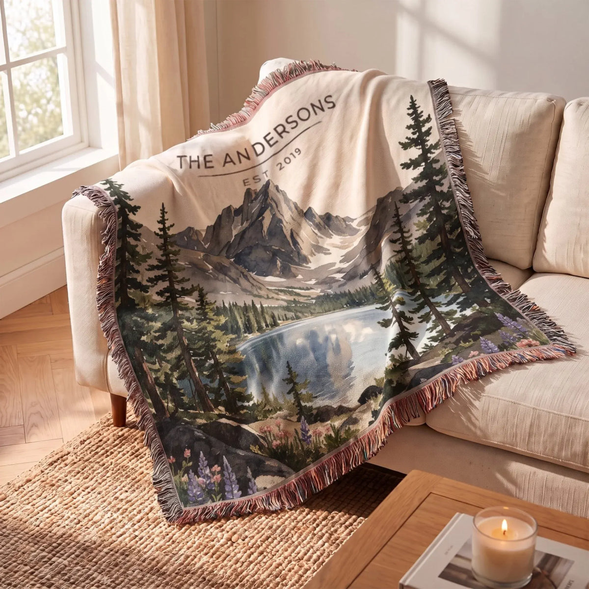 Rocky Mountain Dream Lake Woven Blanket draped over a sofa