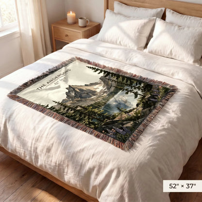 Rocky Mountain Dream Lake Woven Blanket 52x37 on a queen bed