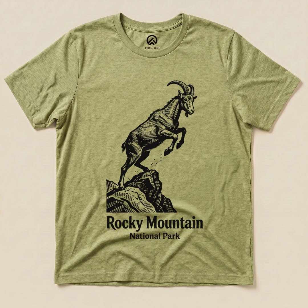 A graphic t-shirt featuring a leaping goat and text that reads "Rocky Mountain National Park" in a rugged design.