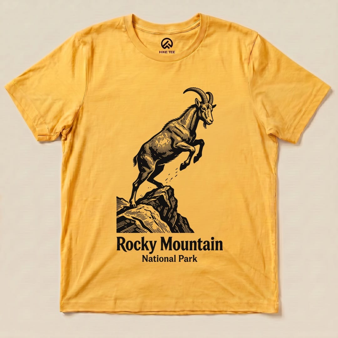 A yellow graphic t-shirt features a leaping mountain goat design and the text "Rocky Mountain National Park Shirt.