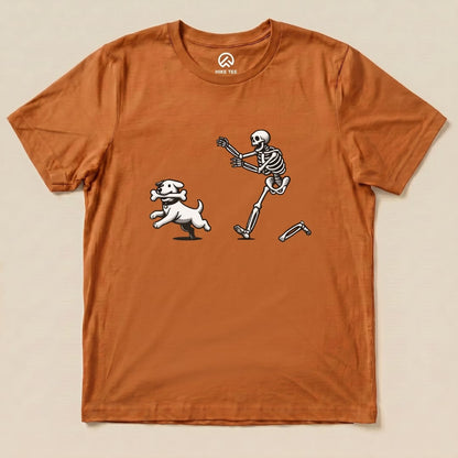 A graphic t-shirt featuring a playful skeleton chasing a dog holding a bone, showcasing the Skeleton and Dog Shirt design.