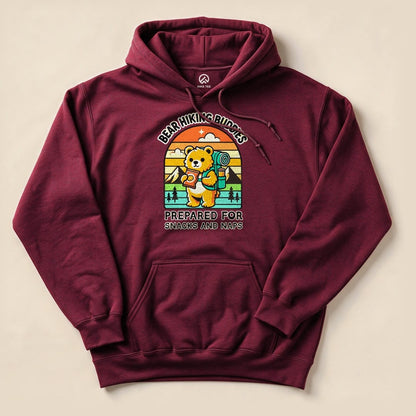 A maroon hoodie featuring a bear with a backpack, with the text "Prepared for Snacks and Naps" above the graphic, labeled as "Snacks and Naps Hiking Bear Hoodie".