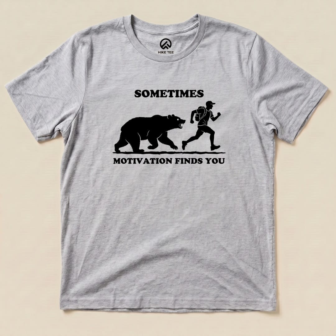Athletic Heather Sometimes Motivation Finds You Shirt with a bear chasing a runner graphic