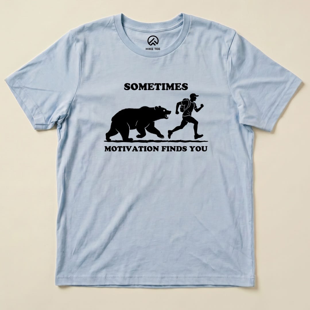 Baby Blue Sometimes Motivation Finds You Shirt with a bear chasing a runner graphic