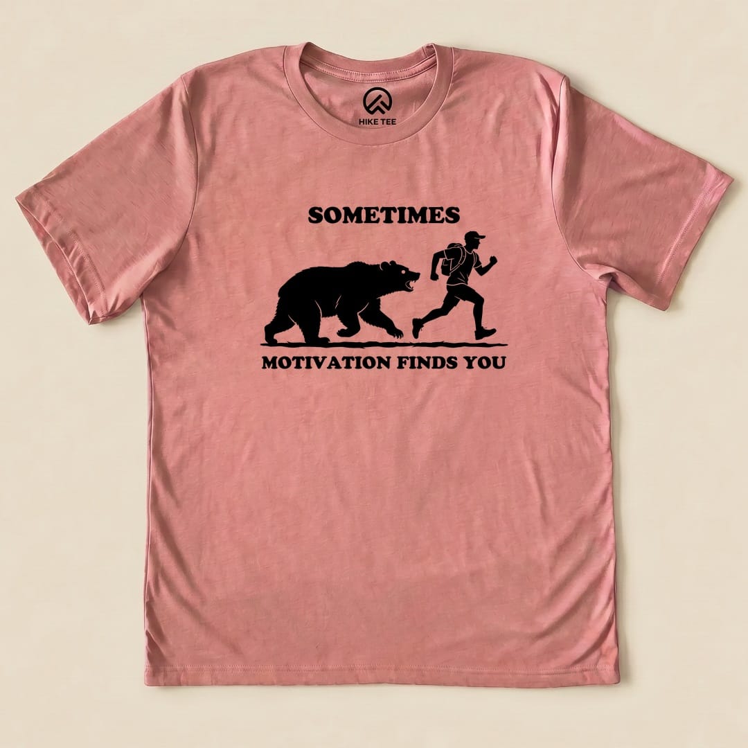 Heather Mauve Sometimes Motivation Finds You Shirt with a bear chasing a runner graphic