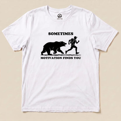 White Sometimes Motivation Finds You Shirt with a bear chasing a runner graphic