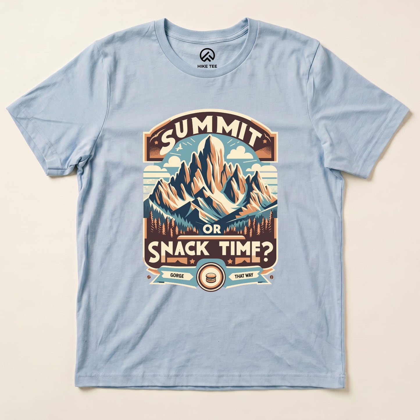 Light blue graphic t-shirt featuring a mountain design with "Summit Or Snack Time?" text, perfect for outdoor enthusiasts.