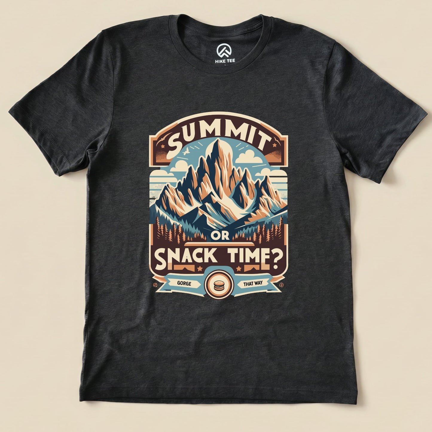 Graphic t-shirt featuring a mountain design and the slogan "Summit or Snack Time?" perfect for outdoor enthusiasts.