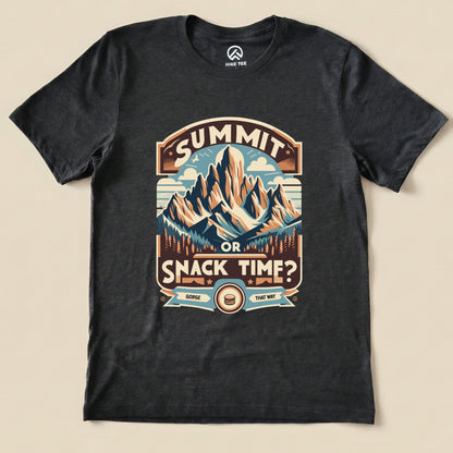 Graphic t-shirt featuring a mountain design and the slogan "Summit or Snack Time?" perfect for outdoor enthusiasts.