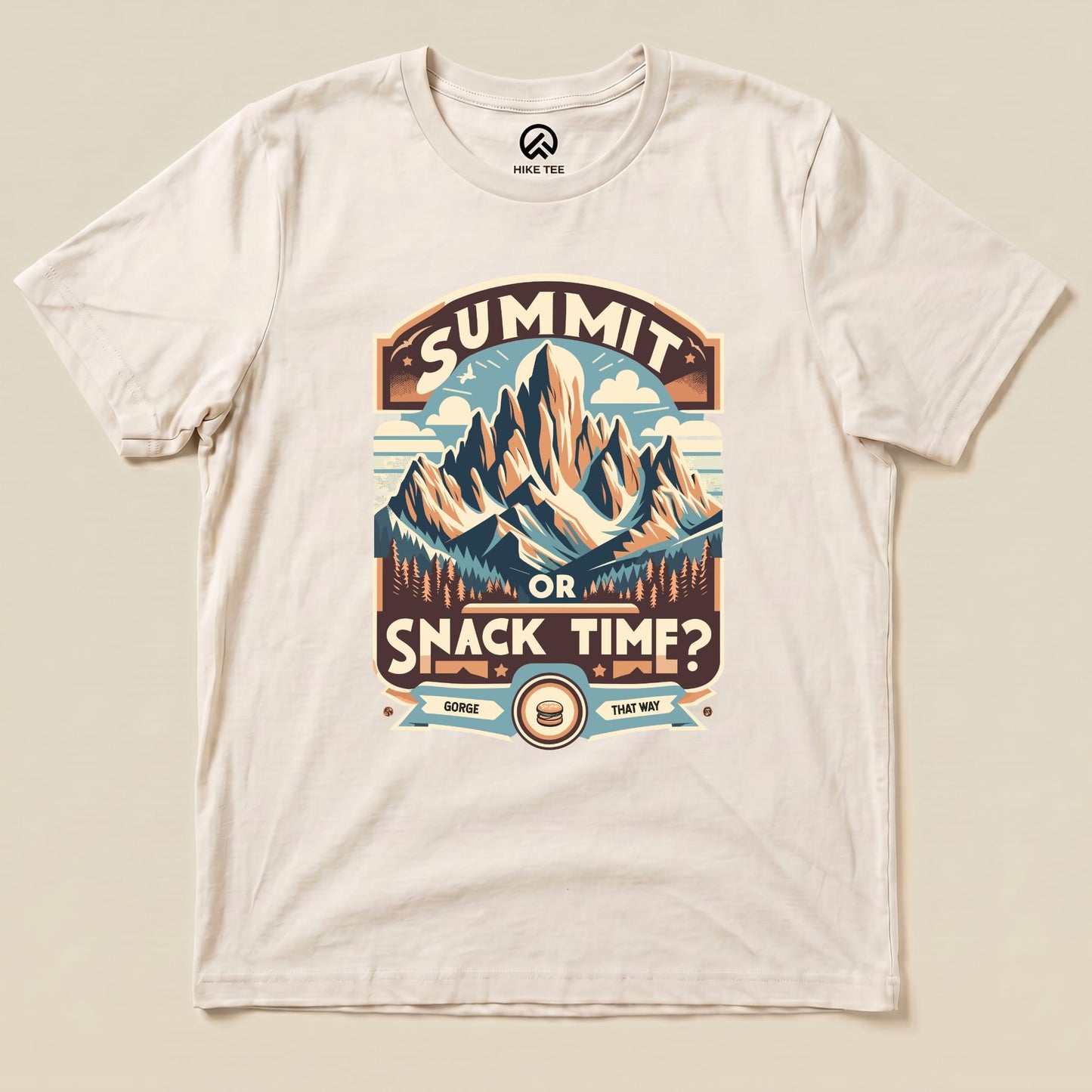 Graphic t-shirt featuring "Summit Or Snack Time?" slogan with a mountain scene, perfect for outdoor enthusiasts and hikers.