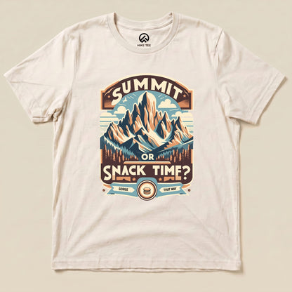 Graphic t-shirt featuring "Summit Or Snack Time?" slogan with a mountain scene, perfect for outdoor enthusiasts and hikers.
