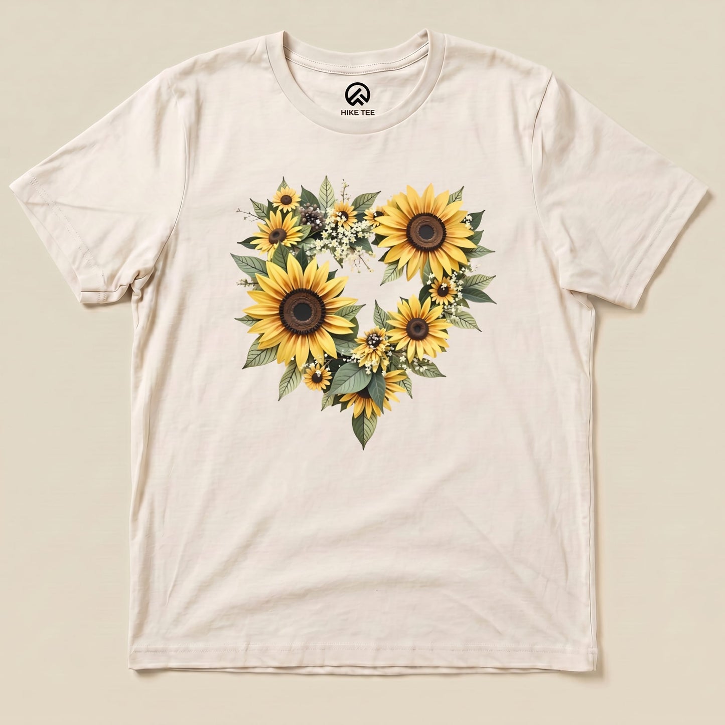 A graphic t-shirt featuring a heart-shaped arrangement of vibrant sunflowers and greenery, labeled "Sunflowers Heart Shirt.