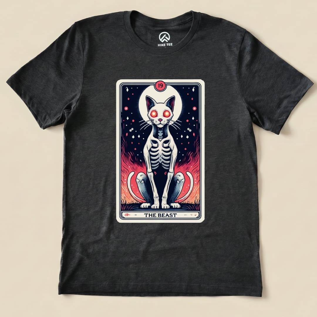The graphic t-shirt features "The Beast Tarrot Cat shirt," showcasing a skeleton cat with glowing eyes and vibrant flames.